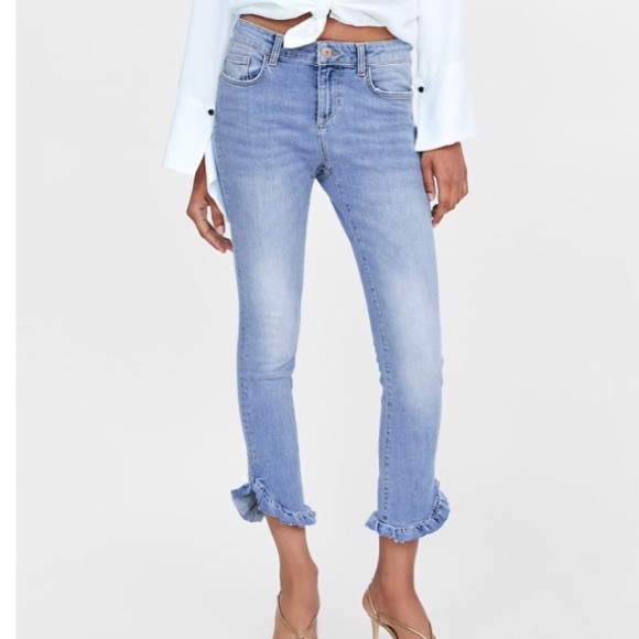 blue jeans with ruffles on the bottom